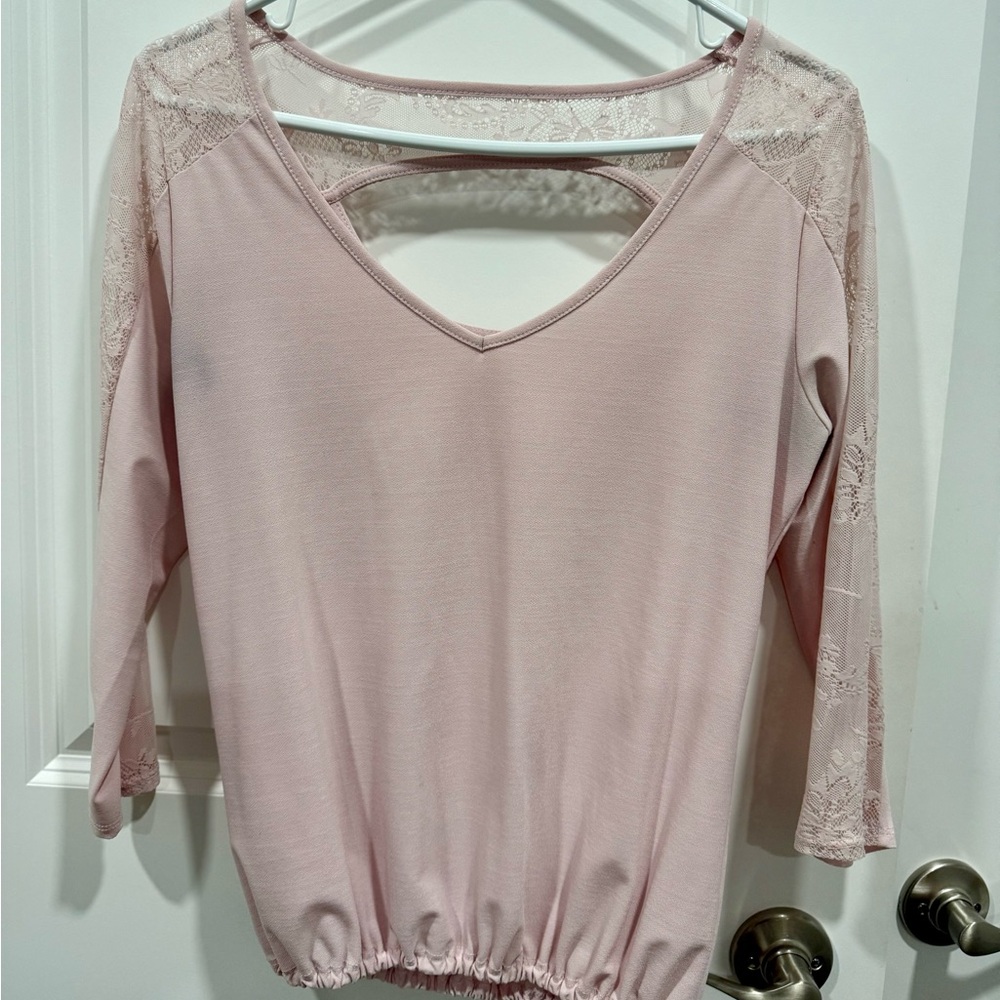 Light pastel pink blouse with lace